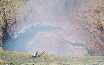 Geologist Jeff Johnson working in the inner crater of Villarrica, an active volcano in Chile.